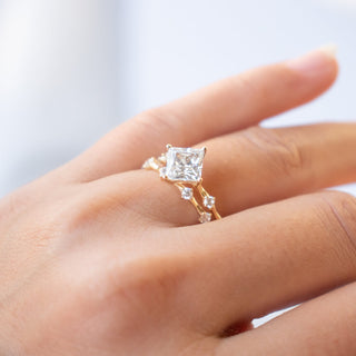 Radiant round full eternity moissanite wedding band shown on a finger