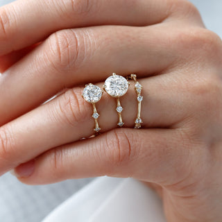 Graceful round half eternity moissanite wedding band top view image 2