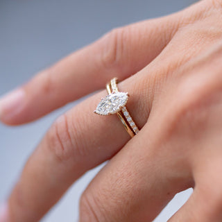 Shimmering 1.0ct marquise solitaire moissanite ring shown on a finger