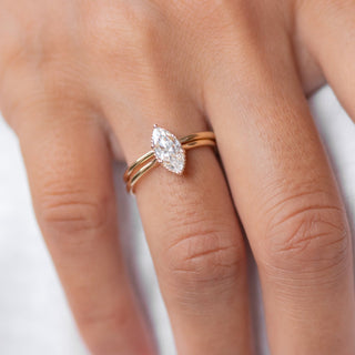 Shimmering 1.0ct marquise solitaire moissanite ring close up of the setting