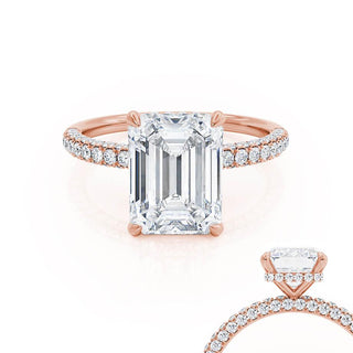 Refined 1.75ct emerald hidden halo moissanite ring shown on a finger