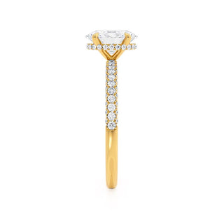 Timeless 4.20ct oval hidden halo moissanite ring shown on a finger