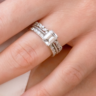 Vintage round half eternity moissanite wedding band three quarter angled view image 3
