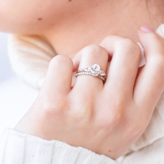 Delicate round full eternity moissanite wedding band top view