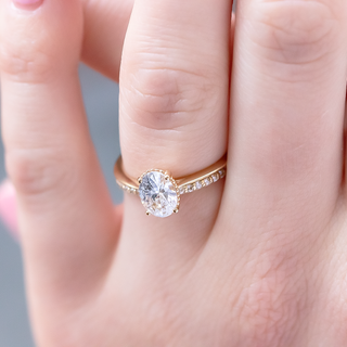Chic round full eternity moissanite wedding band three quarter angled view