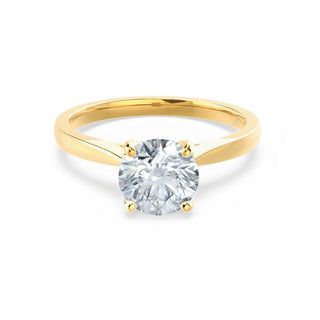 Lustrous 1.20ct round solitaire moissanite ring side profile view