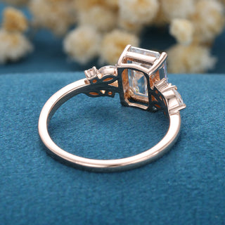 1.60 CT Emerald Cut Cluster Halo Moissanite Engagement Ring on hand