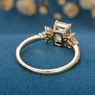 0.92 CT Emerald Cut Cluster Halo Moissanite Engagement Ring on hand