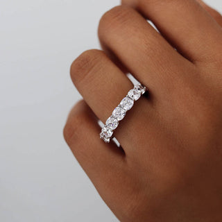 Classic 5.61ct cushion full eternity moissanite wedding band side profile view