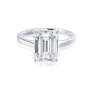 Modern 1.75ct emerald solitaire moissanite ring angled view showing its sparkle