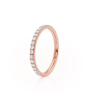 Modern 0.21ct round full eternity moissanite wedding band angled view showing its sparkle