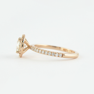 Shimmering 1.0ct round halo moissanite ring side profile view