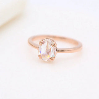 Timeless 1.33ct oval solitaire moissanite ring angled view showing its sparkle
