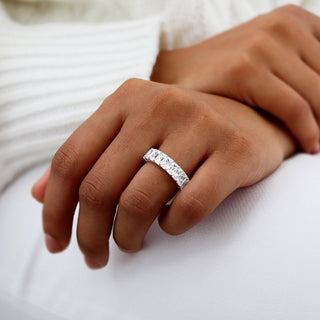Refined 7.26ct radiant full eternity moissanite wedding band angled view showing its sparkle