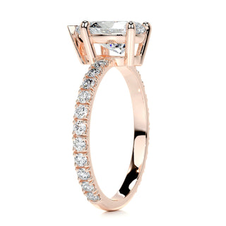 Delicate 1.5ct pear hidden halo moissanite ring side profile view