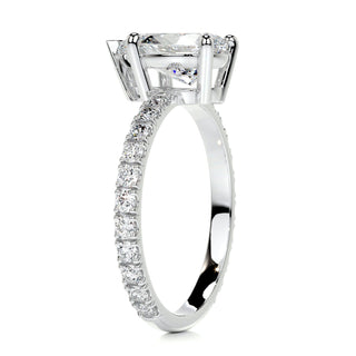 Delicate 1.5ct pear hidden halo moissanite ring sparkle close up