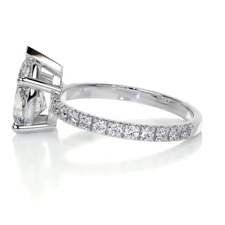 Delicate 1.5ct pear hidden halo moissanite ring overhead view