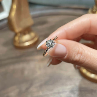 Modern 1.0ct round solitaire moissanite ring close up of the setting