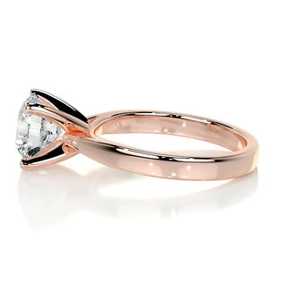 Shimmering 2.0ct round solitaire moissanite ring shown on a finger