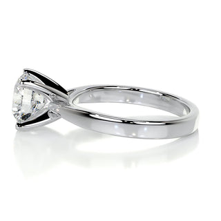 Shimmering 2.0ct round solitaire moissanite ring tilted view catching the light