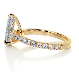 Brilliant 1.5ct pear hidden halo moissanite ring shown on a finger