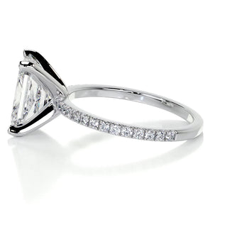 Refined 3.0ct radiant pave moissanite ring tilted view catching the light