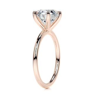 Exquisite 2.0ct round solitaire moissanite ring angled view showing its sparkle