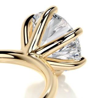 Sparkling 2.0ct round solitaire moissanite ring tilted view catching the light