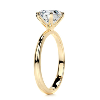Elegant 2.5ct round solitaire moissanite ring angled view showing its sparkle