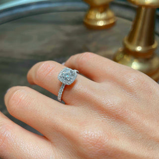 Bold 1.0ct round halo moissanite ring three quarter angled view