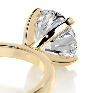 Bold 2.0ct round solitaire moissanite ring angled view showing its sparkle