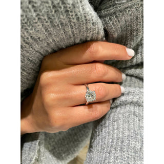 Bold 3.0ct round solitaire moissanite ring three quarter angled view