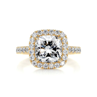 Luminous 2.0ct cushion halo moissanite ring tilted view catching the light
