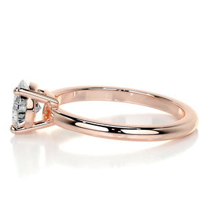 Dazzling 1.0ct pear solitaire moissanite ring shown on a finger