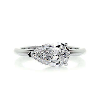 Shimmering 1.0ct pear solitaire moissanite ring tilted view catching the light