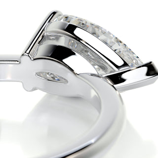 Dazzling 1.0ct pear solitaire moissanite ring three quarter angled view
