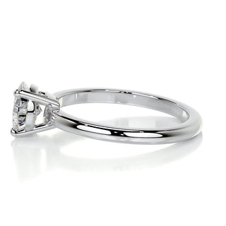 Elegant 1.0ct pear solitaire moissanite ring side profile view
