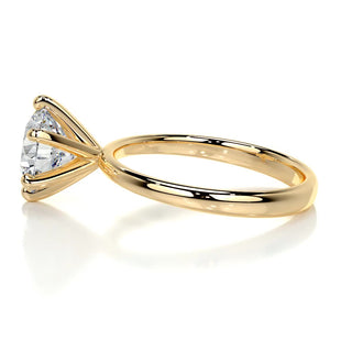 Graceful 2.0ct round solitaire moissanite ring side profile view