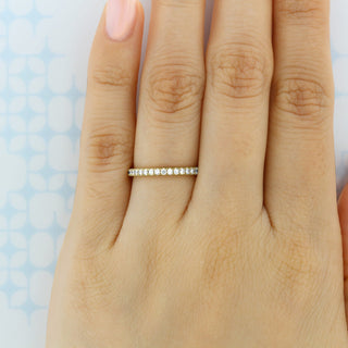 Bold round full eternity moissanite wedding band top view