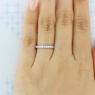 Refined round full eternity moissanite wedding band top view