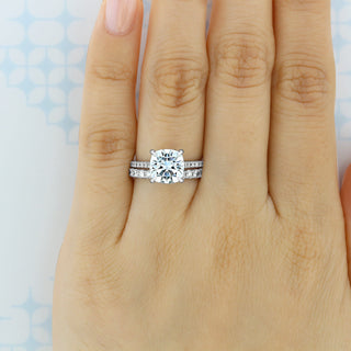 Delicate round full eternity moissanite wedding band three quarter angled view