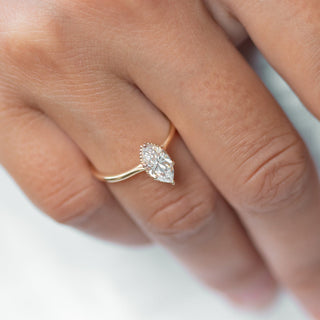 Shimmering 1.0ct marquise solitaire moissanite ring front view