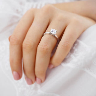 Lustrous 1.20ct round solitaire moissanite ring sparkle close up
