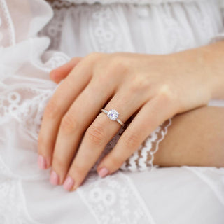 Lustrous 1.20ct round solitaire moissanite ring overhead view