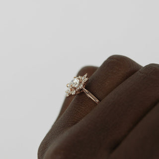 Shimmering 1.05ct round cluster moissanite ring side profile view