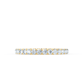 Lustrous 0.44ct round full eternity moissanite wedding band angled view showing its sparkle