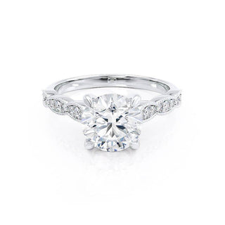 Delicate 1.0ct round solitaire moissanite ring angled view showing its sparkle image 2
