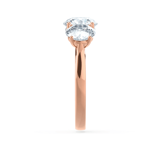 Lustrous 1.50ct round three stone moissanite ring top view