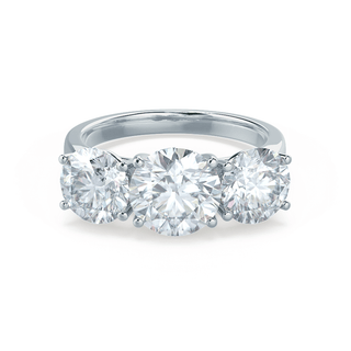 Lustrous 1.50ct round three stone moissanite ring side profile view