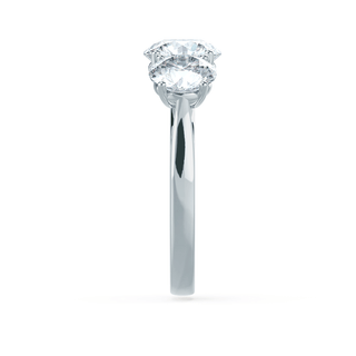 Luminous 1.50ct round three stone moissanite ring close up of the setting
